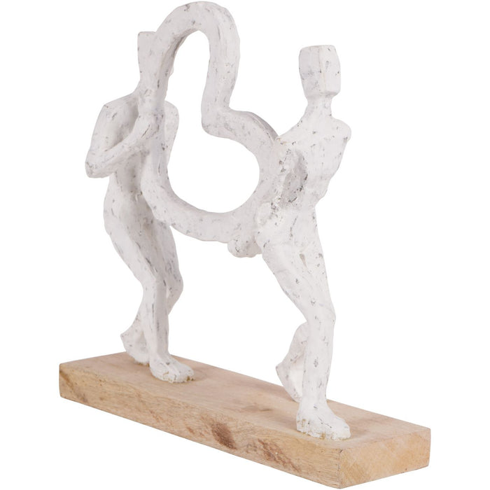 White Sculpture Of A Couple Holding A Heart