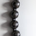 Beatrice Round Decorative Metal Wall Mirror In Black