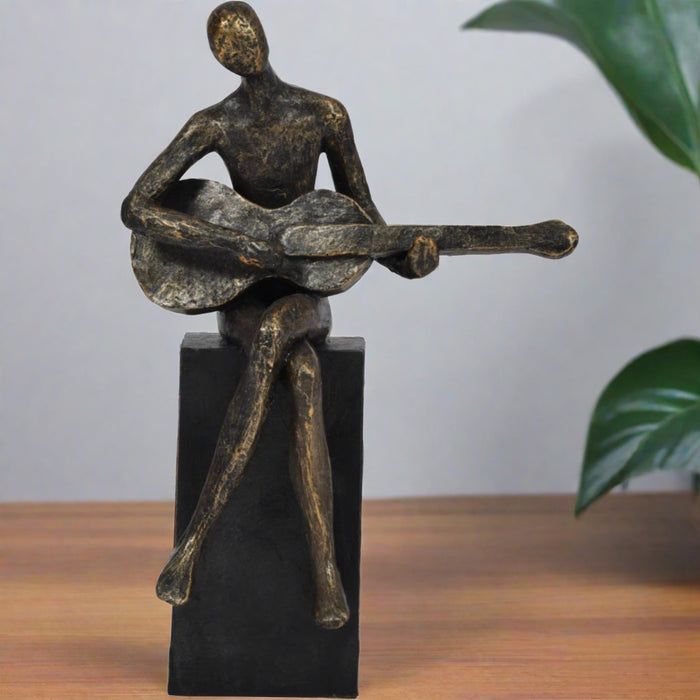 Denton Playing Guitarist Sculpture, Aged Bronze