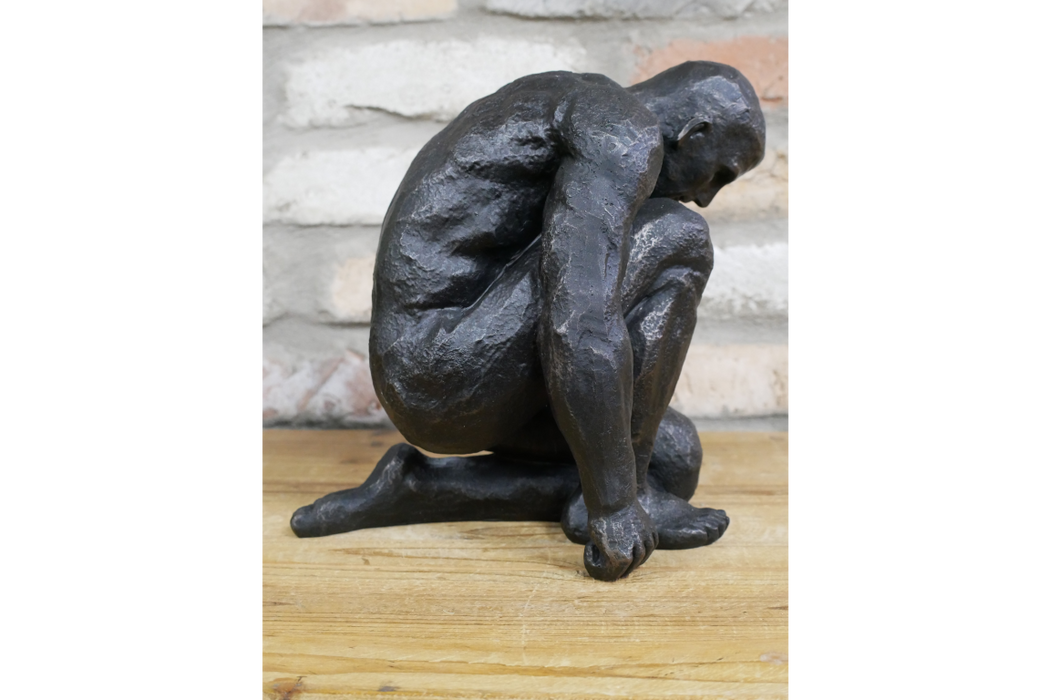 Coulter Kneeling Man Sculpture, Aged Black