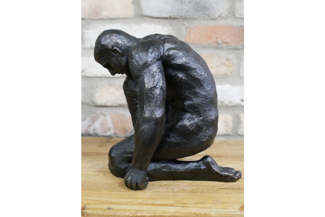 Coulter Kneeling Man Sculpture, Aged Black