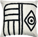 a black and white pillow with a geometric design