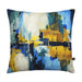 a blue and yellow pillow on a white background